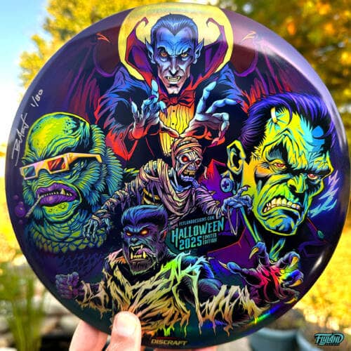 Illustration of Frankenstein, Dracula, the Mummy, the Wolfman, and The Creature From the Black Lagoon on a Discraft Buzzz disc golf disc, Foil Edition