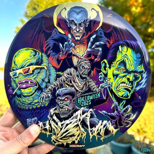 Illustration of Frankenstein, Dracula, the Mummy, the Wolfman, and The Creature From the Black Lagoon on a Discraft Buzzz disc golf disc, Foil Edition